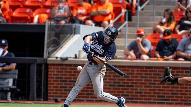 Dallas Baptist outfielder Jace Grady (29) hits during a game in the NCAA Stillwater Regional between the Oklahoma State Cowboys (OSU) and the Dallas Baptist Patriots at O'Brate Stadium in Stillwater, Okla., on Saturday, June 3, 2023.